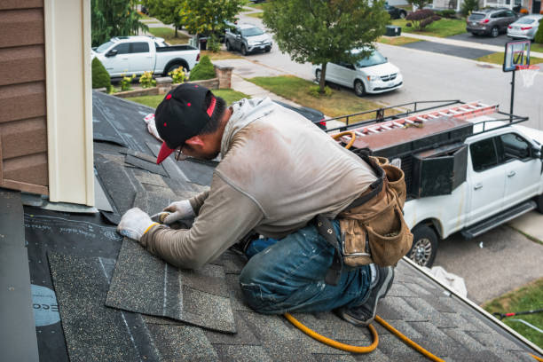 Professional Roofing technician working in East Dubuque, IL